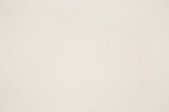 Reef Woven Fabric in Ecru – a soft, warm neutral with subtle texture, perfect for creating calm, light-filled interiors.