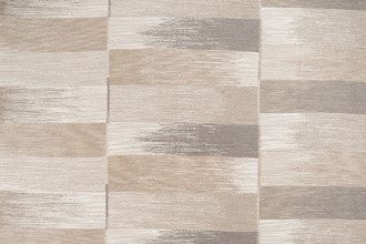 Subtle Natural Ikat Weave Fabric, featuring a mix of neutral tones that create an elegant, understated design perfect for versatile interiors.