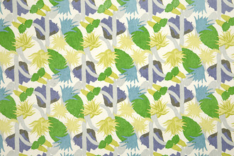 Cactus Flower Printed Wallpaper in rich grass green with a bold floral design. This modern, nature-inspired pattern by Commune for Christopher Farr Cloth adds vibrant texture and features striking blue and green tones.