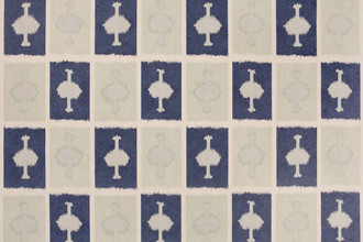 Ozone Printed Wallpaper in Cobalt — a vibrant cobalt hue with a striking ikat geometric design in a textured grid layout, creating a bold, artisanal backdrop with rhythmic structure.