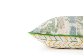 Side view of Small Way Lemon cushion showing Contrast between Small Way print and Loom Weave reverse, with vivid green trim detail.