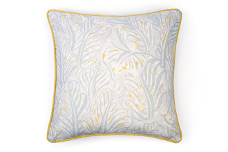 Mille Feuilles Cushion – front view showing Raoul Dufy’s large-scale botanical print in pale blue on natural linen, finished with a yellow trim.