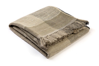 Textured woven striped natural throw black edging Christopher Farr cloth.