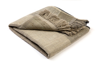Textured woven striped natural throw black edging Christopher Farr cloth.