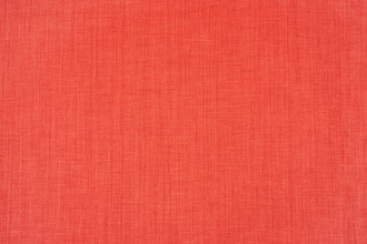 Soprano plain coloured printed linen fabric in bright coral, red colour. Ideal for upholstery, curtains, and home decor accessories.