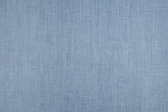 Soprano plain coloured printed linen fabric in denim colour. Ideal for upholstery, curtains, and home decor accessories.