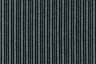 Divide Woven Fabric in Sea Blue, featuring cool blue and beige stripes in a tactile woven finish, bringing a calm, coastal-inspired feel to spaces.