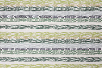 Verde colourway Kit Kemp Bookend Perennials® Performance Woven Fabric featuring a vibrant striped arrow design in blue and green hues.