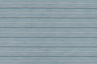 A horizontal stripe woven fabric in turchese, featuring fresh turquoise and blue hues, perfect for coastal-inspired spaces and outdoor living.