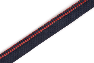 Hopscotch Performance Piping in Rosso, featuring a bold red woven square design, bringing a strong, vibrant accent to commercial and outdoor furniture.
