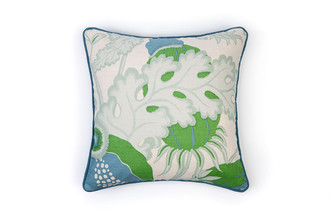 Carnival Cushion in Green – featuring Michael Szell’s pomegranate print in green, blue, and white on natural linen, 50x50cm.