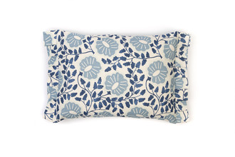 Denim Punch Paisley cushion featuring tonal blue floral paisley design on white linen with pleated edges for added texture and detail.