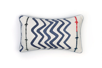 Front view: Indigo blue cushion with white linen base, featuring red embroidered striped stitching between printed zigzag lines, finished with coordinating piping.