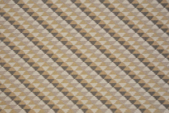 Woven fabric in natural colours in a geometric pattern