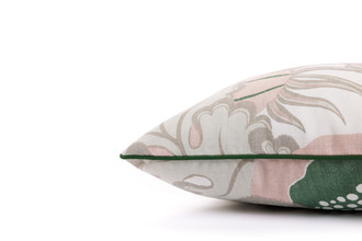 Side view of Carnival Cushion in Latte – highlighting the pink, green and white pomegranate, finished with green piping, 45x45cm.