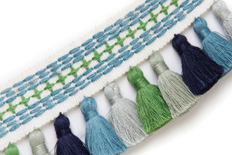 Jamboree Tasselled Tape in Green — a vibrant green tasselled trim with artisanal texture, perfect for adding a joyful, design-forward finish to curtains, cushions, and upholstery.