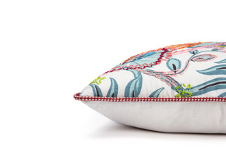 Limited Edition 03 Aubergine Carnival Cushion featuring a vibrant purple and blue tone with a hand-stitched pomegranate floral and leaf design, side view.