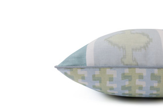 Side view of Ozone and Cremaillere Outdoor Cushion featuring a bold and repetitive geometric design in Turchese, blues, greens and white, contrasting geometrics, offering a modern yet timeless look for outdoor spaces.