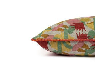 Side View Cactus Flower Bolster Cushion in Ruby with Circus Hot Pink piping, measuring 90x35cm, featuring a vibrant floral pattern in red, green, pink, and yellow.