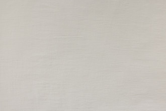 Ecru colourway of the Nendo Collection wide-width curtain fabric. A linen and cotton mix with multicoloured stitching woven through a neutral base, inspired by rainfall.