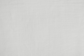 Squall wide-width woven curtain fabric in ecru, showcasing a subtle linear weave with tonal neutral detailing. Lightweight yet structured, ideal for refined curtains and soft drapery schemes.