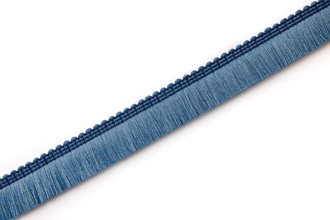 Chichi outdoor fringe trim in Azzurro light side, a luxurious reversible performance fringe with contrasting blue tones, perfect for outdoor soft furnishings.