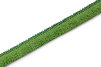 Chichi outdoor fringe trim in Prato side, a dense reversible performance fringe with two-tone green and blue hues, designed for durable outdoor cushions and upholstery.