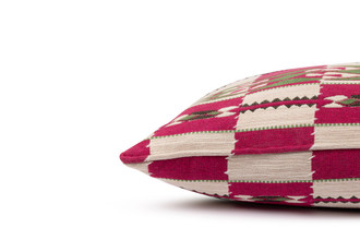 Decorative Chubby Check bolster cushion in Hot Pink, designed to add playful pattern to sofas and beds