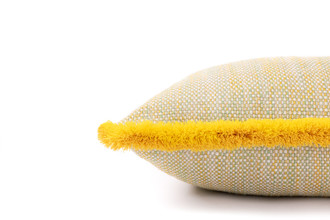 Side detail, Lomi Chichi cushion 45x45cm in kiwi with multicolour Chichi fringe trim, vibrant outdoor cushion