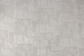 Mirage double-width hemp and linen woven fabric with a subtle metallic shimmer by Christopher Farr Cloth. In flax and ecru.