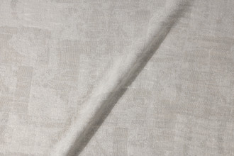 Mirage double-width hemp and linen woven fabric with a subtle metallic shimmer by Christopher Farr Cloth. In flax and ecru.