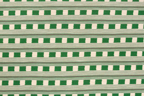 Lost and Found fabric in fresh green, showcasing a woven check with contrasting pink stripes. A lively and refreshing hue that adds energy and sophistication to bespoke upholstery projects, luxury soft furnishings, and unique home interiors.