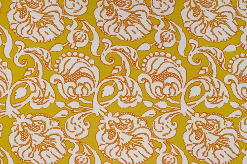 Anna floral linen fabric in lemon tones with a repetitive floral pattern, designed by Michael Szell for Christopher Farr Cloth.
