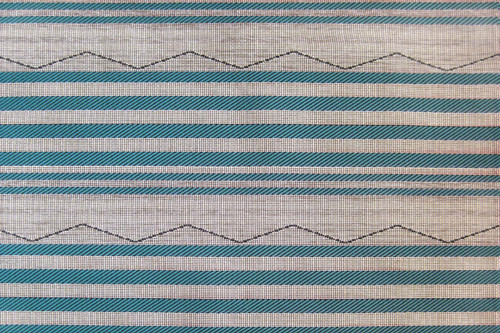MARE Performance Woven Fabric in Turchese, featuring a bold zigzag stripe in turquoise and neutral tones, ideal for adding vibrancy and texture to interior and exterior high-traffic spaces.