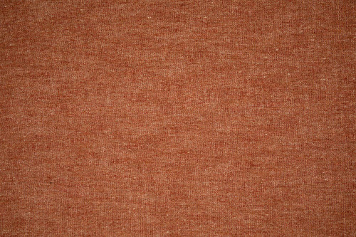 Denali Plain Woven Fabric in Terracotta, with a warm, earthy orange-brown tone and textured weave, ideal for adding rustic charm and depth to interiors.
