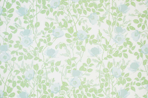 Floral design in pale green tones with pale blue flowers.