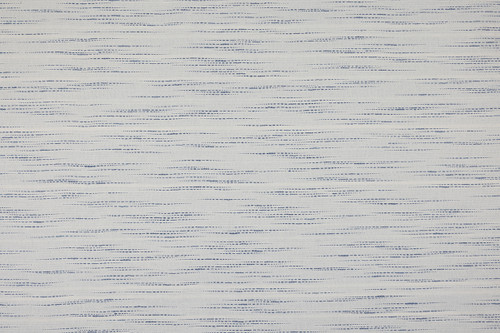 Indigo colourway of the Nendo Collection wide-width curtain fabric. Linen and cotton mix with subtle multicoloured woven stitching on a neutral ground, rain-inspired for texture and depth.