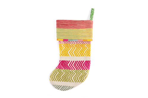 Bookend Christmas stocking with embroidered boot and striped trim in bright multi-colours, made from Christopher Farr Cloth remnants — a one-of-a-kind heirloom gift.