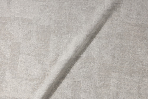 Mirage double-width hemp and linen woven fabric with a subtle metallic shimmer by Christopher Farr Cloth. In flax and ecru.