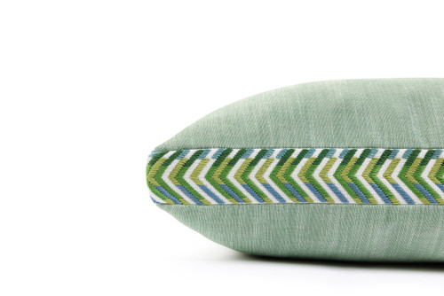 Side view of Maroma box cushion 45x45cm in verde with Xela Border trim and structured outdoor design