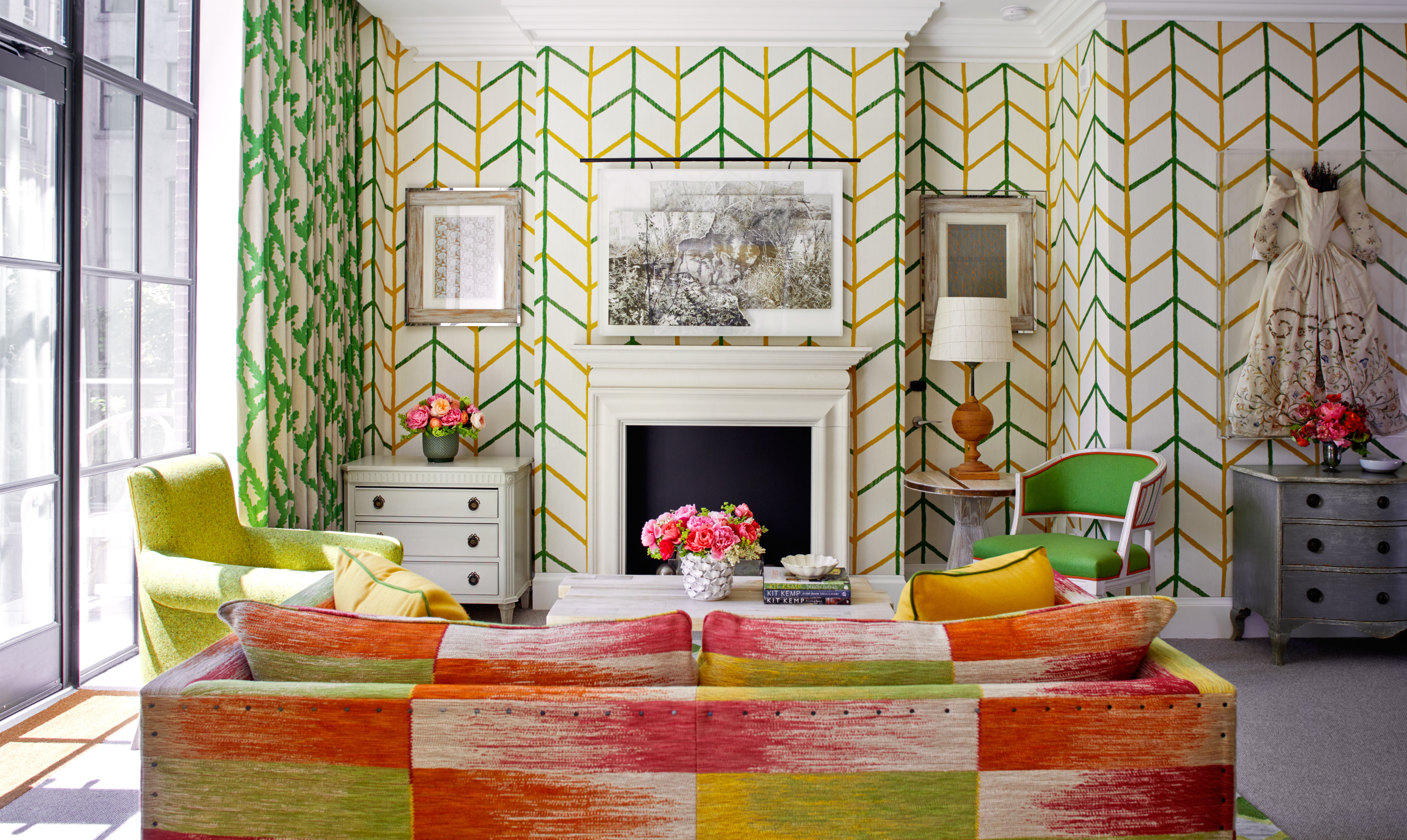 Custom One Way wallpaper in a bespoke colourway for Kit Kemp’s Firmdale Hotel, paired with Ikat Weave fabric in Lime by Christopher Farr Cloth.