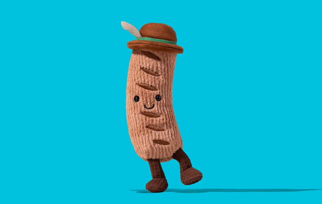 Amuseables Wilhelm von Bratwurst vor blauem Hintergrund