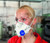 Woman wearing Drager X-plore 1730V FFP3 Valved Respirator Mask NR D