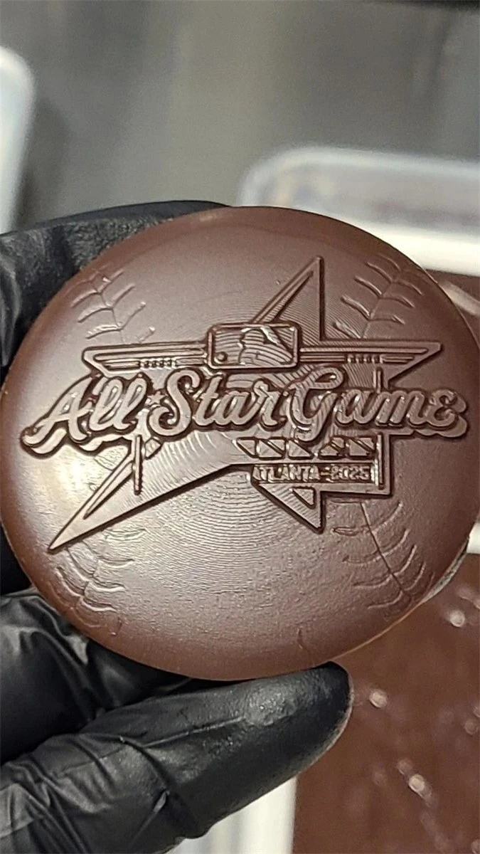 Large chocolate medallion with a deeply embossed team logo