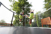 Children bouncing on 12ft Gallus Plus Playground Trampoline