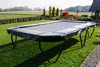 Akrobat Challenger Plus 17x10 trampoline in a garden setting without net
