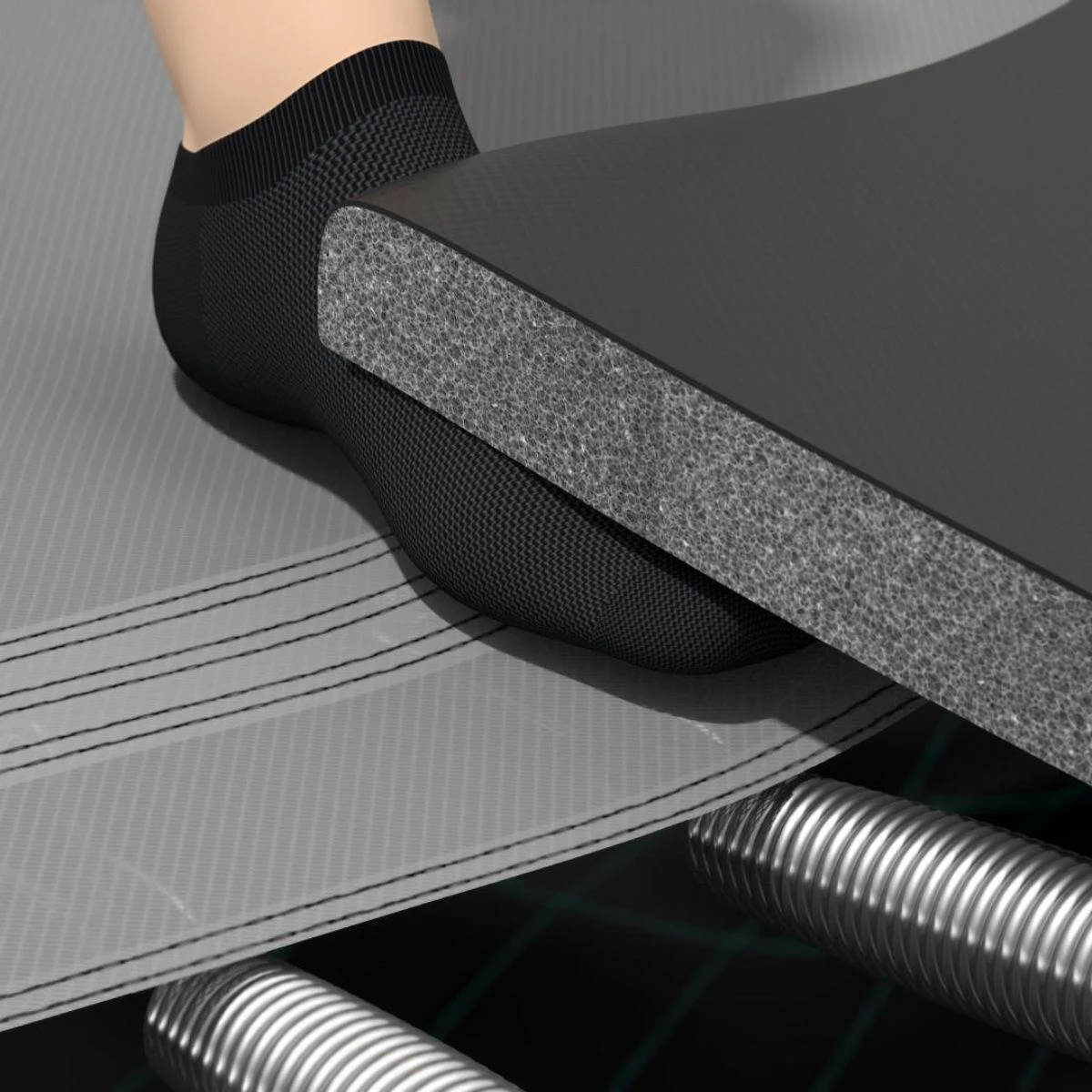Foot on the thick safety pad of the Akrobat Orbit Pro, with the springs covered beneath