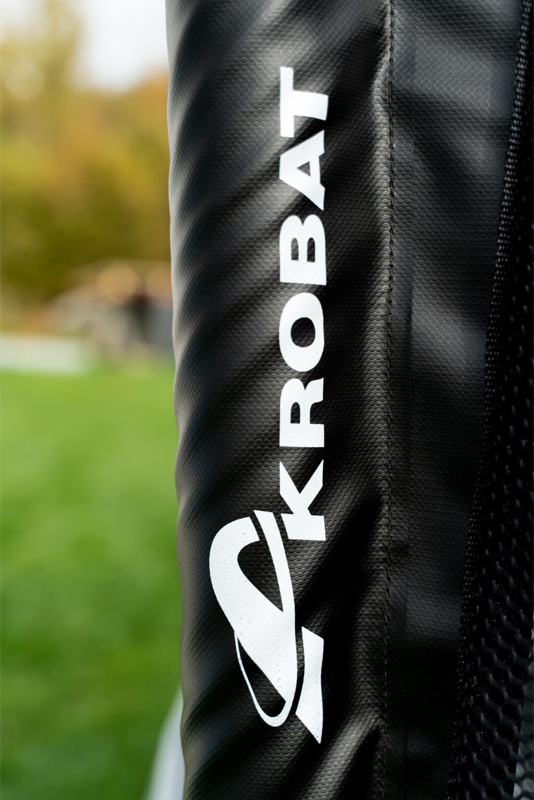Close-up of the curved safety net poles on the Akrobat Orbit Pro