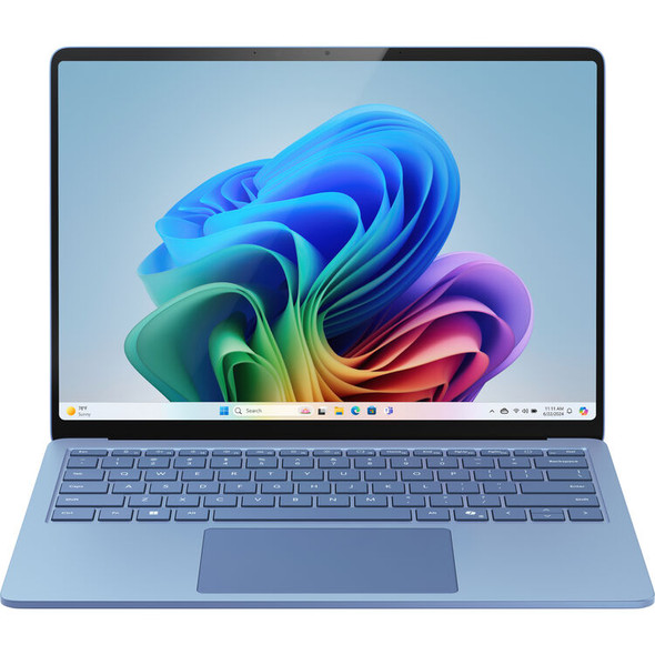 Sapphire Blue Microsoft Surface Laptop 7 13.8-inch open at an angle displaying a vibrant home screen background.