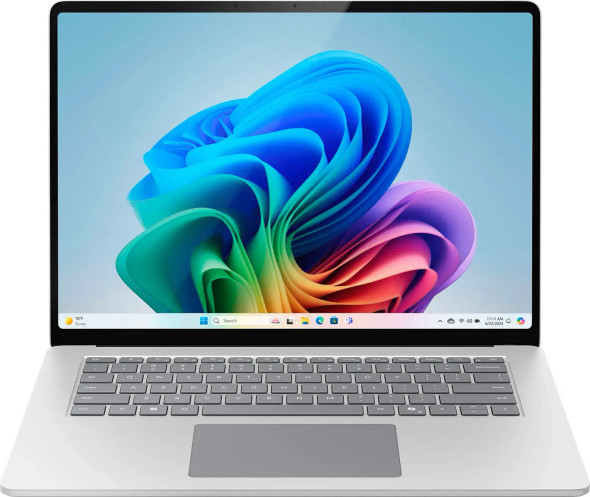Thin-bezel 15-inch PixelSense touchscreen display showing the clean Windows 11 desktop environment.